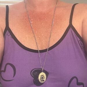 Sarah Coventry vintage ship pendant necklace black on cream and silvertone chain